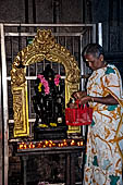 Worship and puja offerings inside the Swamimalai temple. 